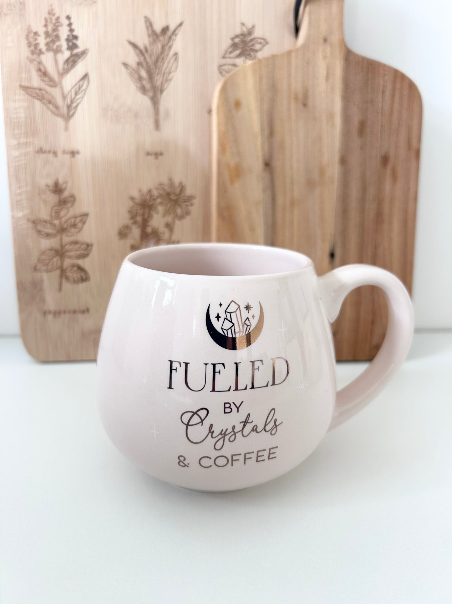 Fueled By Crystals and Coffee Rounded Mug